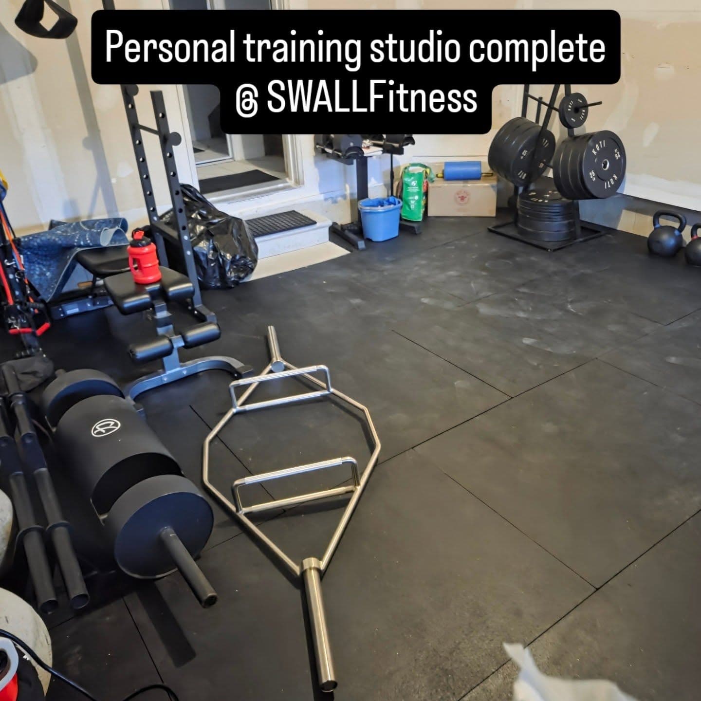 Complete private training studio at SWALL Fitness with pads and bars